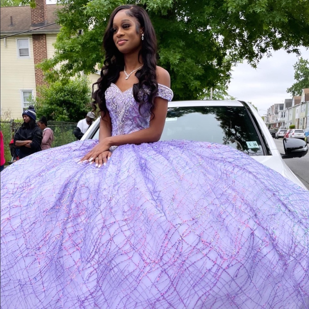 Pretty purple ball gown! Original price $550. Selling for $350. Only worn ONCE